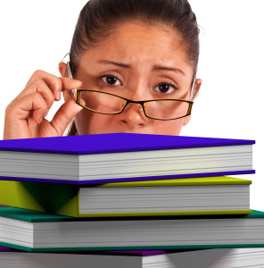 Lady Looking At Books Shows Education